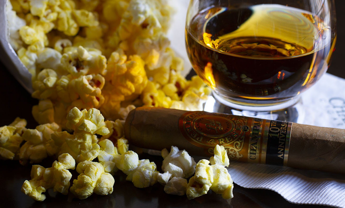 Popcorn, drink, and cigar